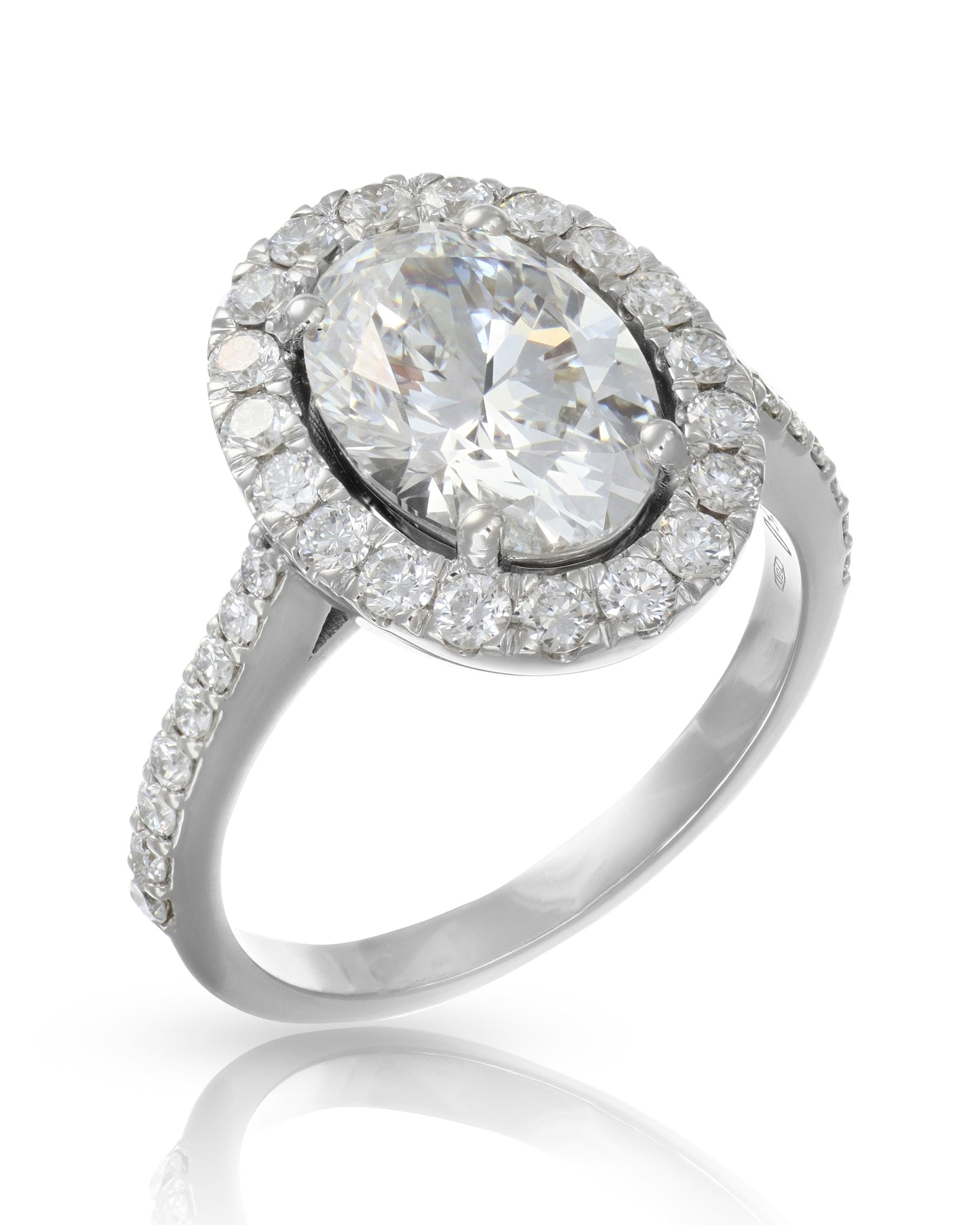 Anello con Smeraldo e giro di Diamanti
